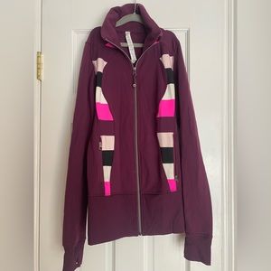 Lululemon zip up jacket. Maroon with color block on each side. Size 2